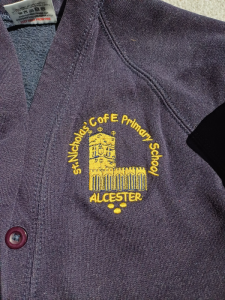 Navy cardigan with school logo